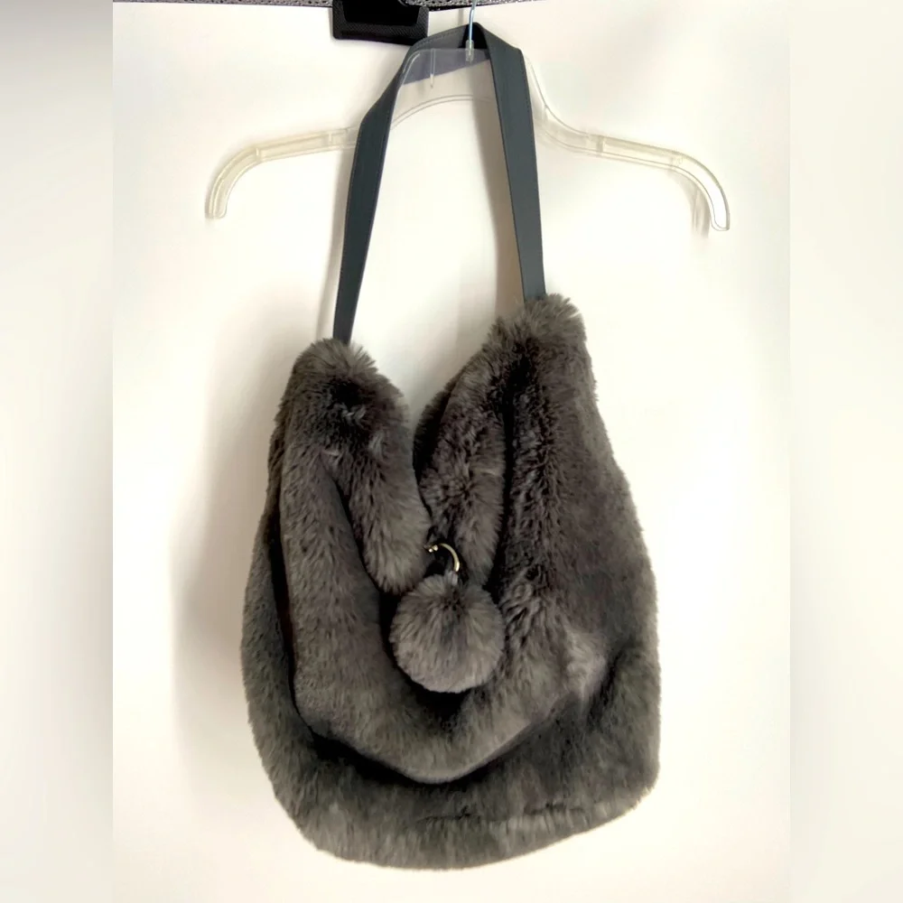 Evelyne Prelonge Faux Fur Shoulder Bag with Pom Pom and Leather Strap Handle